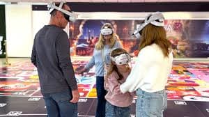 Family interacting inside a shared XR environment.